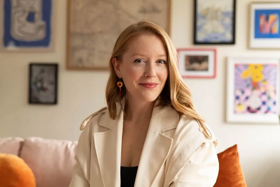 a woman sitting on a couch