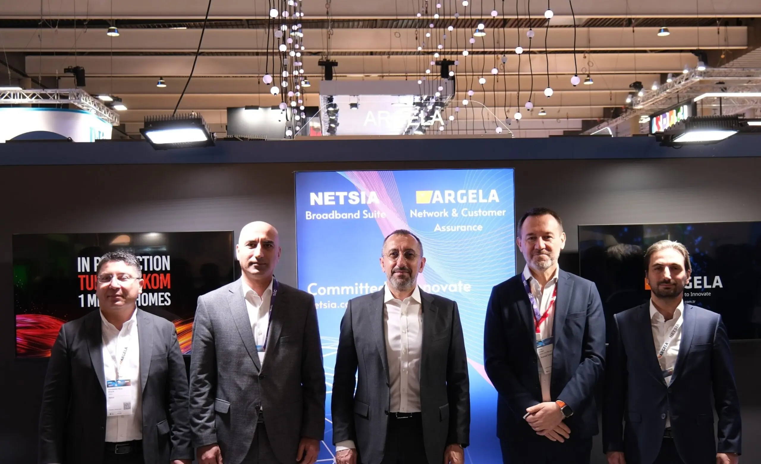 Türk Telekom CEO Umit Önal poses for a photo with Azercell officials after signing a collaboration agreement, Barcelona, Spain, Feb. 26, 2024. (AA Photo)