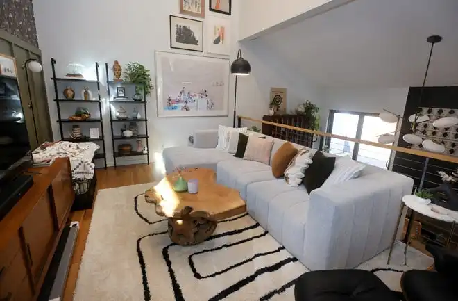 A second sitting room also features eclectic decor.