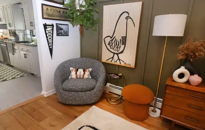 A second sitting area off the kitchen features modern and vintage style.