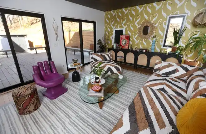 Bold patterns, shapes and colors in the living room are reminiscent of '80s style.