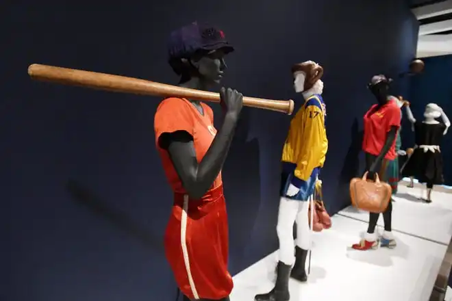 A display of vintage women's baseball, boxing, bowling and basketball uniforms. The newest exhibit at The Cummer Museum of Art and Gardens, Sporting Fashion: Outdoor Girls 1800 to 1960 opened Wednesday, February 28, 2024. The exhibit is made up of 65 ensembles of women's clothing and other related accessories designed, starting in the early 1900s to simply allow women to get outside to walk and garden and as more opportunities opened up, more activity specific clothing was designed with Western cultural expectations taken into account. The exhibit was organized by the American Federation of the Arts and FIDM Museum of the Fashion Institute of Design & Merchandising in Los Angeles.