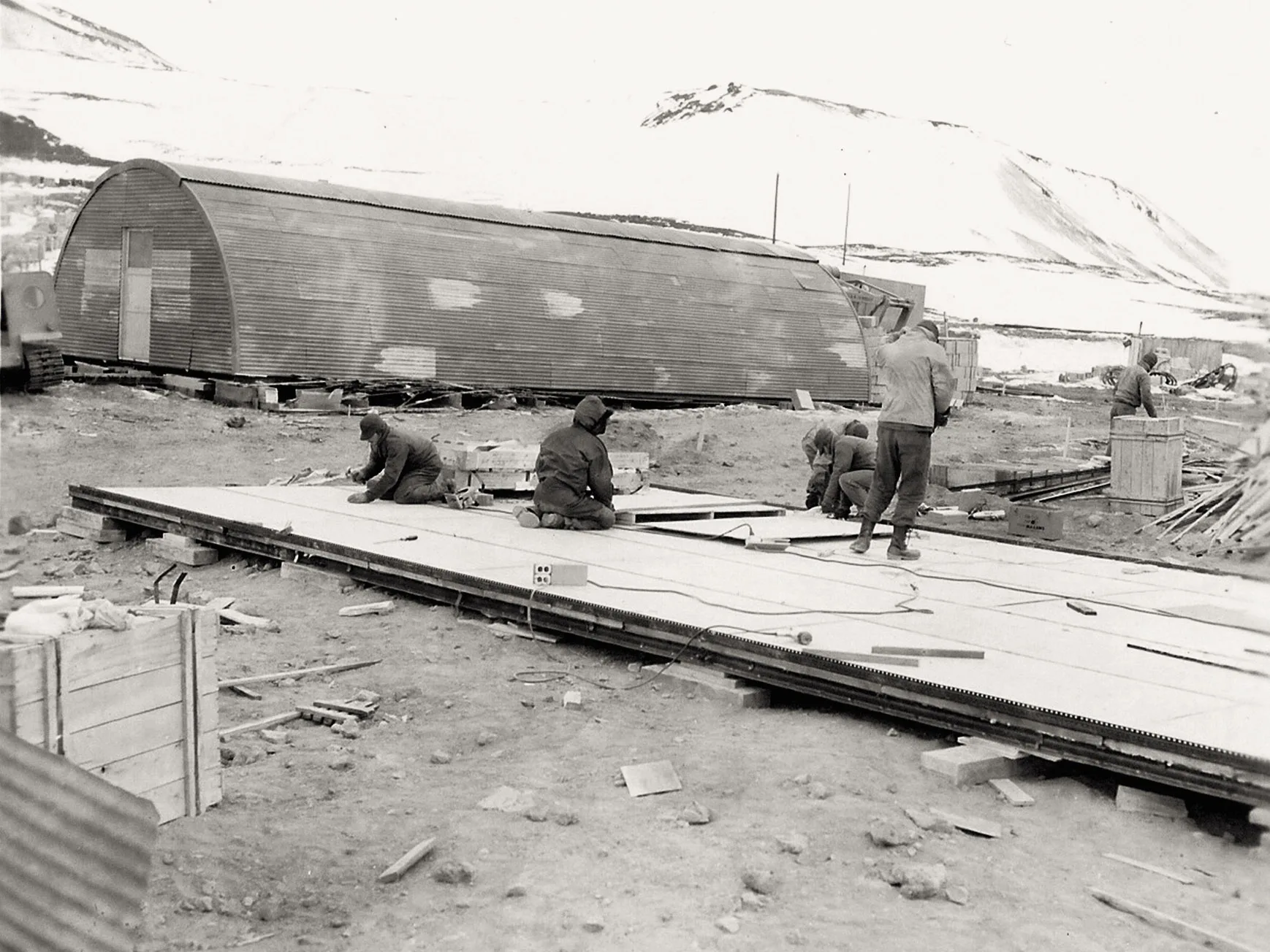 men working to assemble McMurdo Station