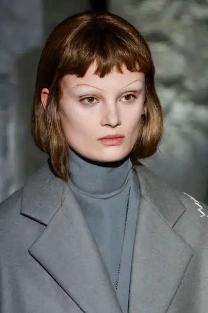 Thin brows and baby bangs at Marni.