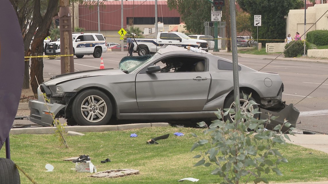 2 people critically injured after car crashes into power pole in Phoenix