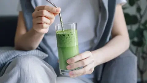 Getty Images Picture of someone with a green drink