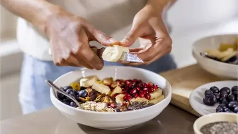 Getty Images Someone preparing a healthy meal