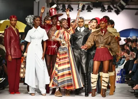 AFP Models present creations by designer Tolu Coker during a catwalk presentation at London Fashion Week in London - February 2024