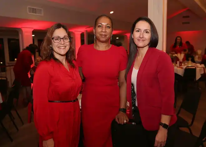 Kerri Levesque, Rose Lopes and Sarah Skulte enjoy the evening at the YWCA 21st Annual Red Dress Fashion Show held Thursday, February 29, 2024 at the Century House in Acushnet.