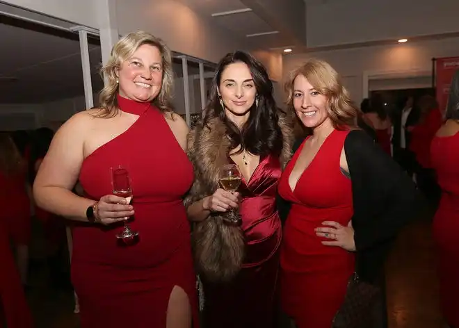 Kira Watkins, Jessica Stad and Amber Tripp enjoy the evening at the YWCA 21st Annual Red Dress Fashion Show held Thursday, February 29, 2024 at the Century House in Acushnet.