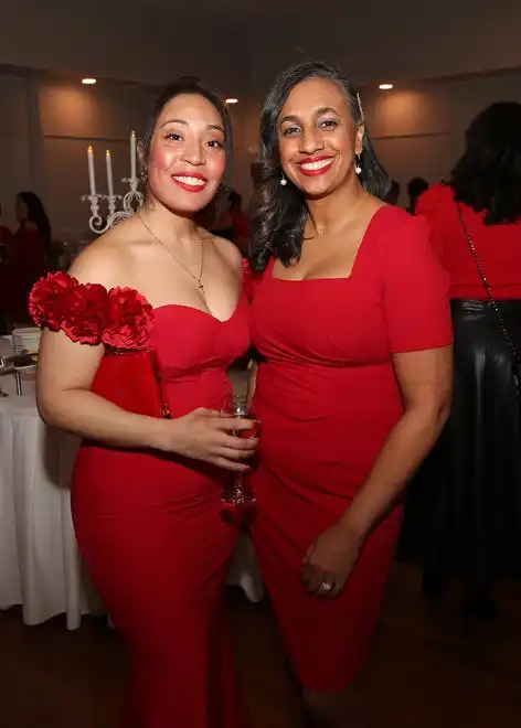 Brittney Ganeto and Eydie Matteos enjoy the evening at the YWCA 21st Annual Red Dress Fashion Show held Thursday, February 29, 2024 at the Century House in Acushnet.