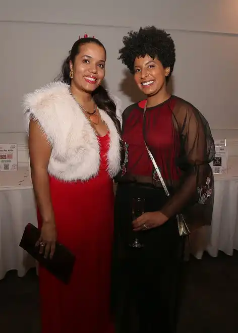 Iva Brito and Dr. Justina Perry enjoy the evening at the YWCA 21st Annual Red Dress Fashion Show held Thursday, February 29, 2024 at the Century House in Acushnet.