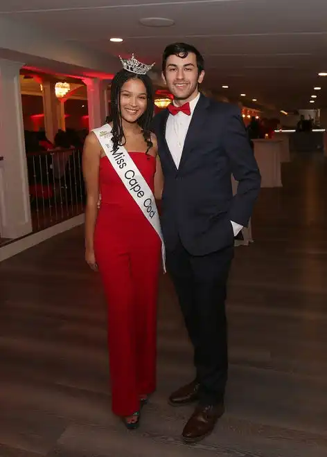 Ashley Clark and Cameron Costa enjoy the evening at the YWCA 21st Annual Red Dress Fashion Show held Thursday, February 29, 2024 at the Century House in Acushnet.