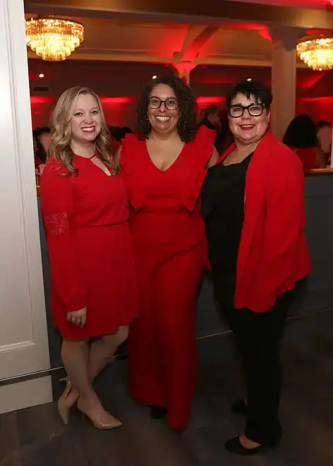 Alyson Goncalves, Jodi Spencer and Octilia Tavares enjoy the evening at the YWCA 21st Annual Red Dress Fashion Show held Thursday, February 29, 2024 at the Century House in Acushnet.