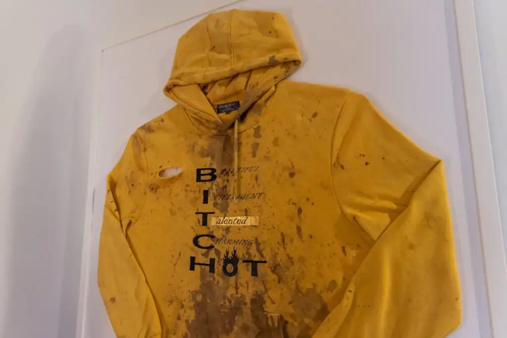 A sweatshirt after an assault is on display