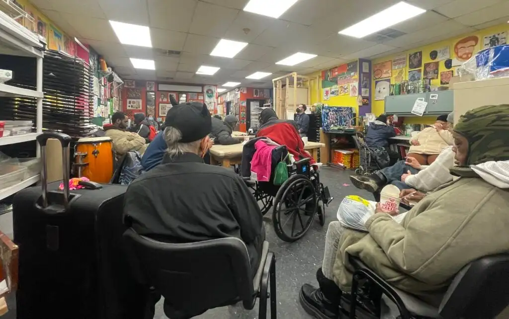 Group of people meditating in a room together