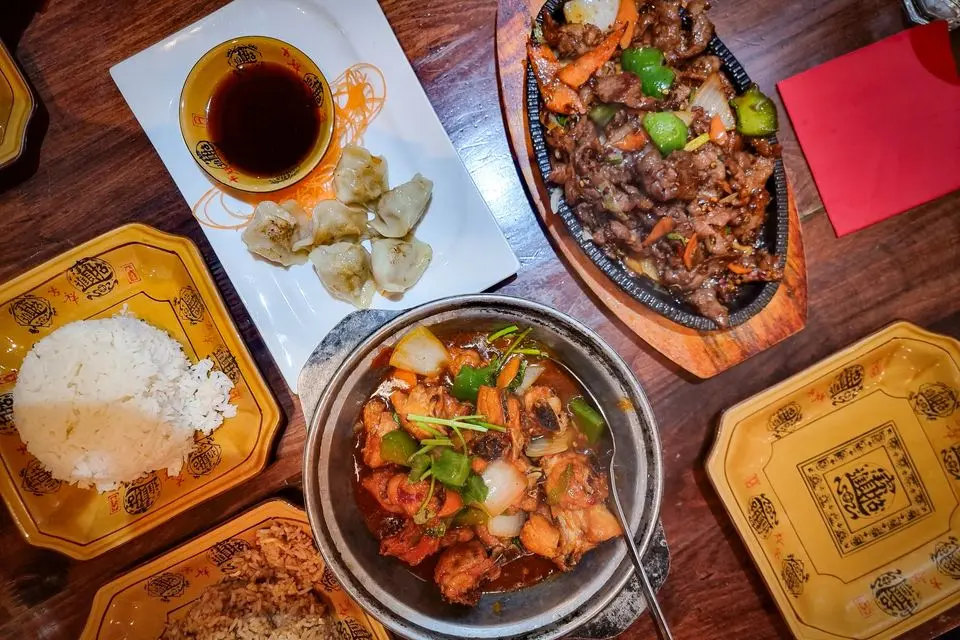 Pork dumplings, spicy chicken pot and sizzling cumin lamb at Chilli House