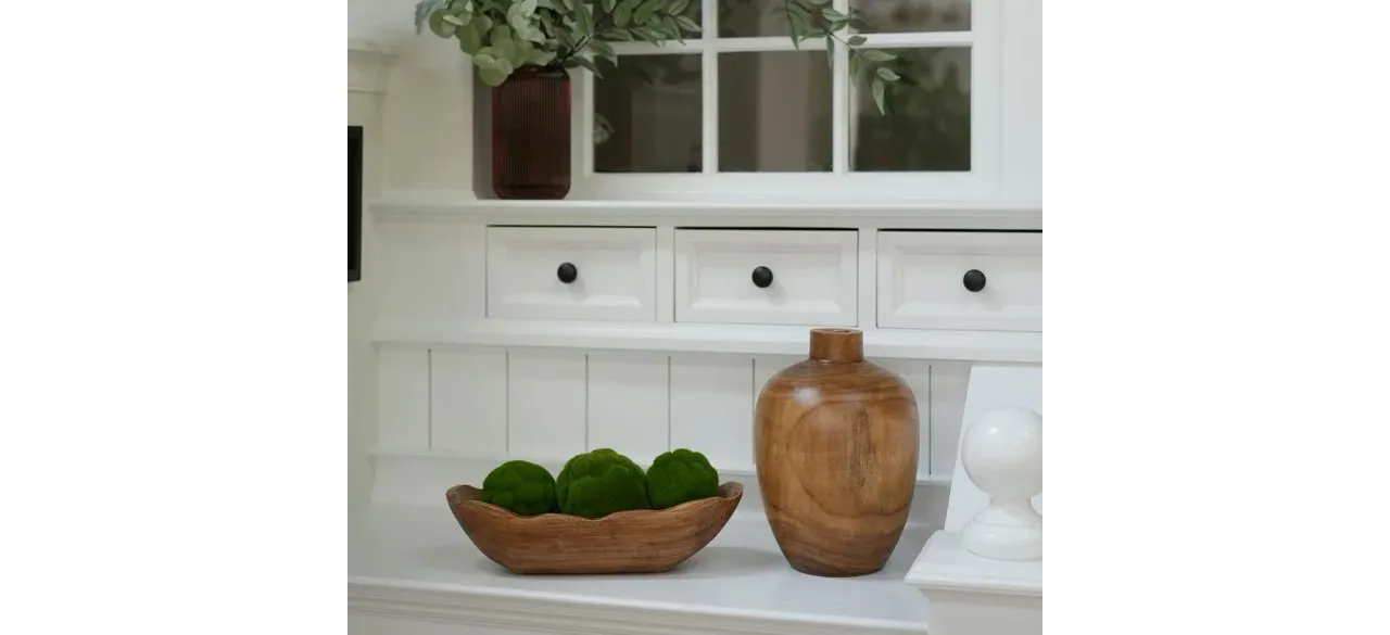 Better Homes & Gardens Indoor Carved Mid-Tone Brown Wood Decorative Dough Bowl on kitchen counter next to vase