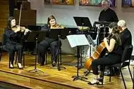 L to R, violinists Maria Schleuning and Nora Scheller, percussionist Drew Lang, violist...