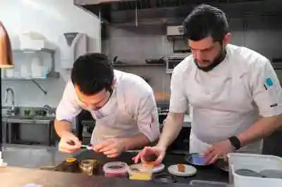 The tiny kitchen has a brigade of Turkish talent including the head chef Ali Siyar, right, and the sous chef Dogukan Toraman