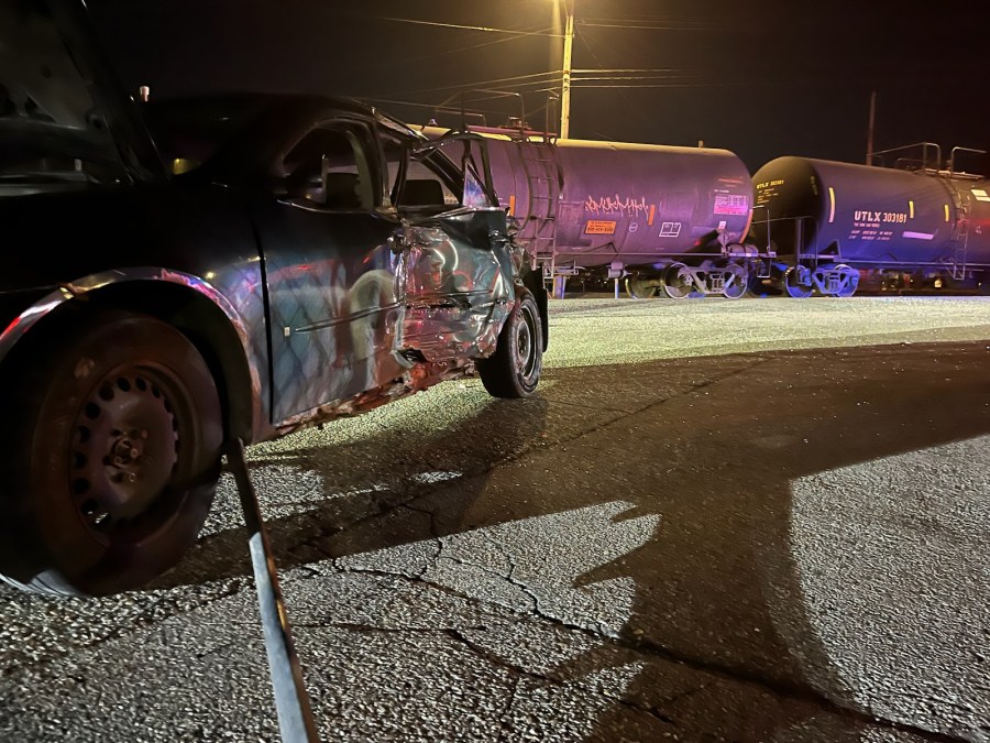 Train crashes into car, shuts down Kalamazoo St.