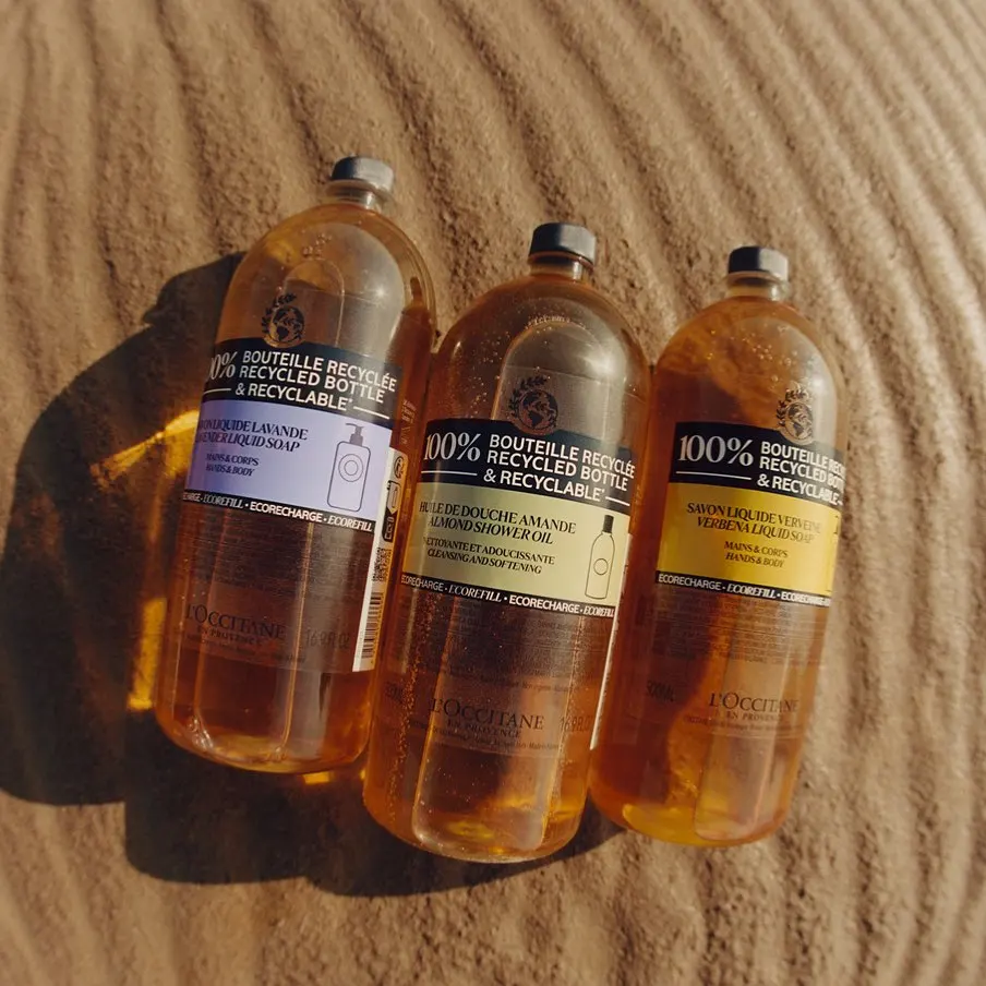 Three bottles on sand. 