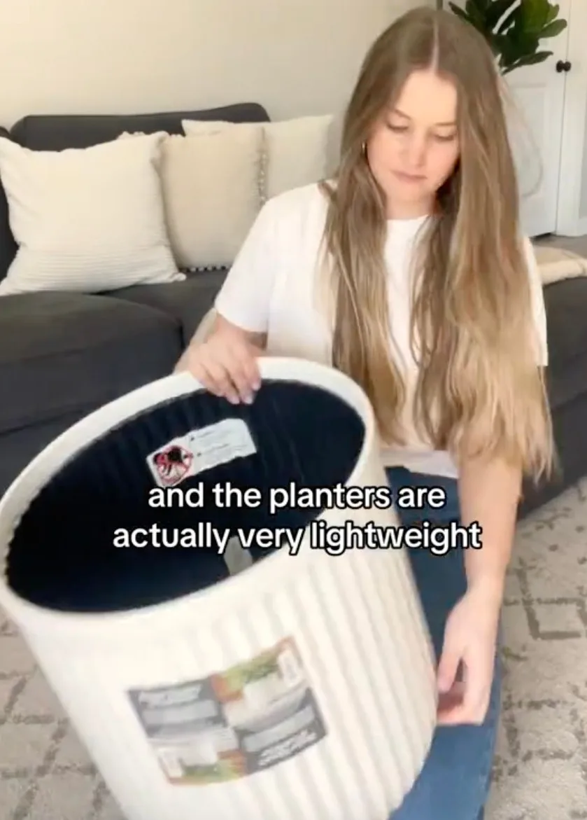 She was about to turn a large planter from Walmart into a decorative end table