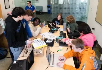 Team members from Courtland High School divide and conquer in their quest to complete the assigned mission during the third annual Innovation Challenge @ Dahlgren. Photo by Dave Ellis.