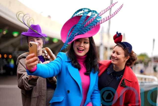 Bright colours and extravagant hats take over Cheltenham Festival fashion