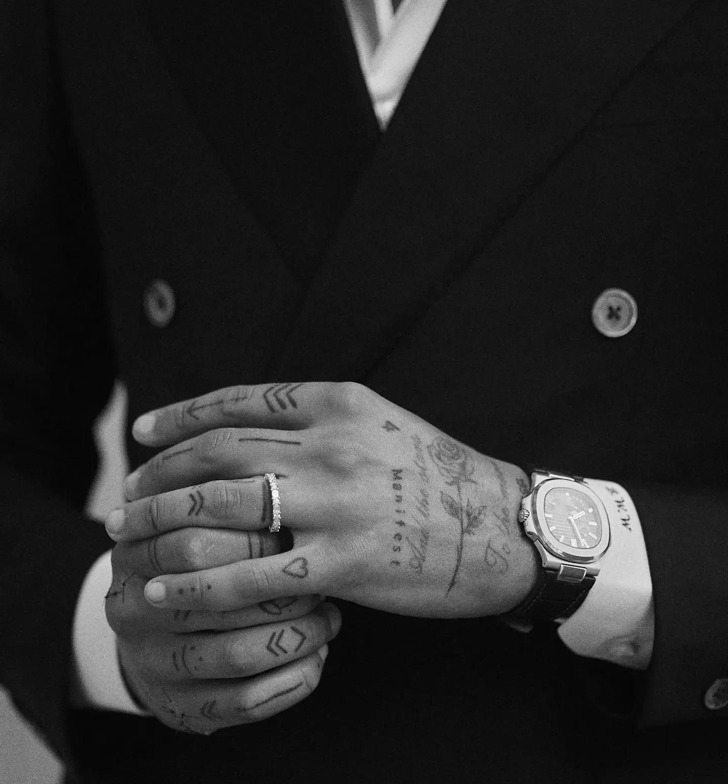 White's hands are also an ode to his love of ink