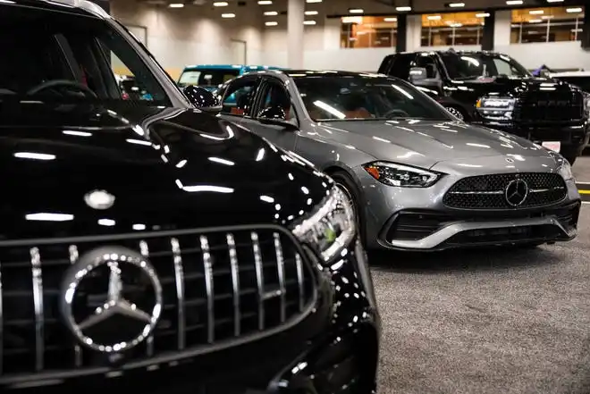 Vehicles from Mercedes-Benz sit on the event center floor during set up for the All Iowa Auto Show Thursday, March 14, 2024, at the Iowa Events Center.