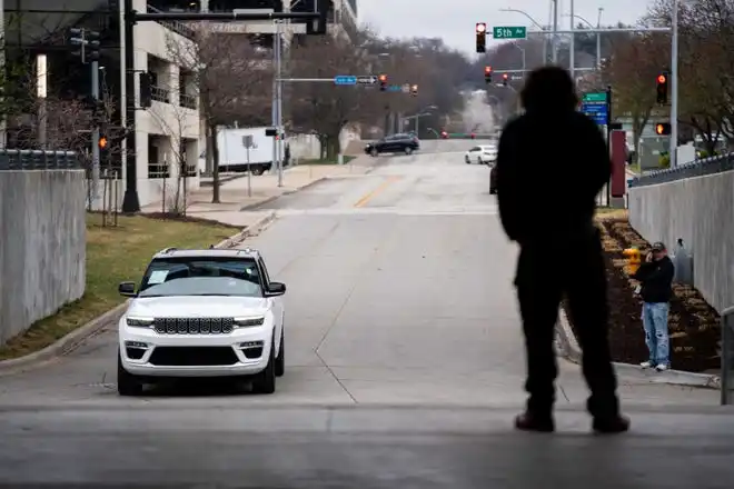 New vehicles from BMW of Des Moines arrive at the event center for the All Iowa Auto Show Thursday, March 14, 2024, at the Iowa Events Center.