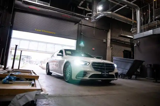 New vehicles from BMW of Des Moines arrive at the event center for the All Iowa Auto Show Thursday, March 14, 2024, at the Iowa Events Center.