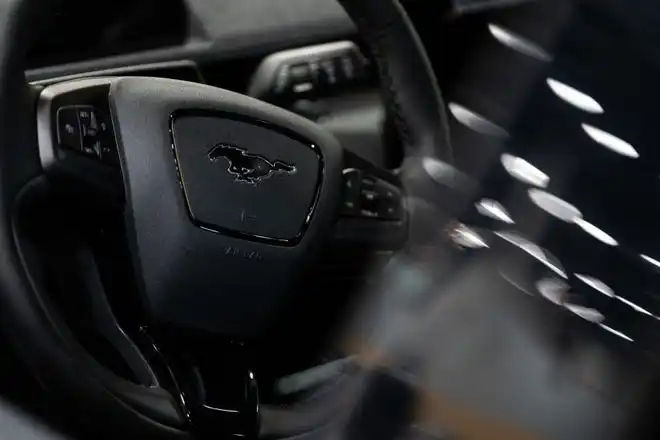 The steering wheel of the new 2024 Ford Mustang Mach-E Thursday, March 14, 2024, at the Iowa Events Center.