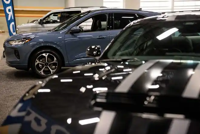 Vehicles from Ford sit on the event center floor as dealers prepare for the 2024 All Iowa Auto Show Thursday, March 14, 2024, at the Iowa Events Center.