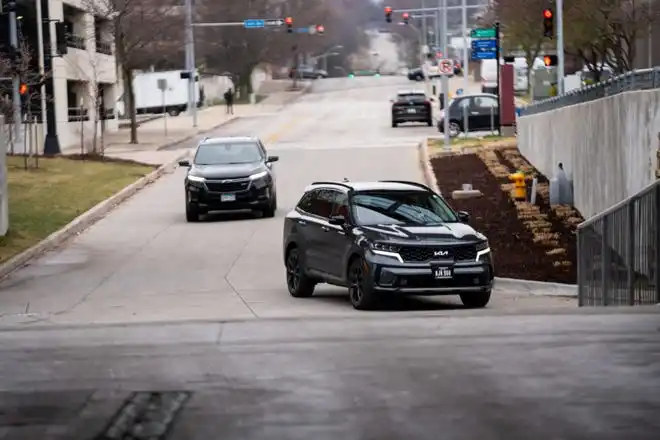 Vehicles arrive for the All Iowa Auto Show Thursday, March 14, 2024, at the Iowa Events Center.