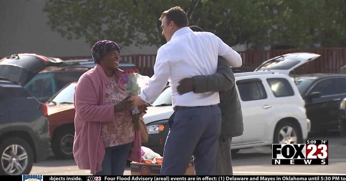 Video: Local nonprofit, Gov. Kevin Stitt give out hundreds of food boxes, flowers to families in need