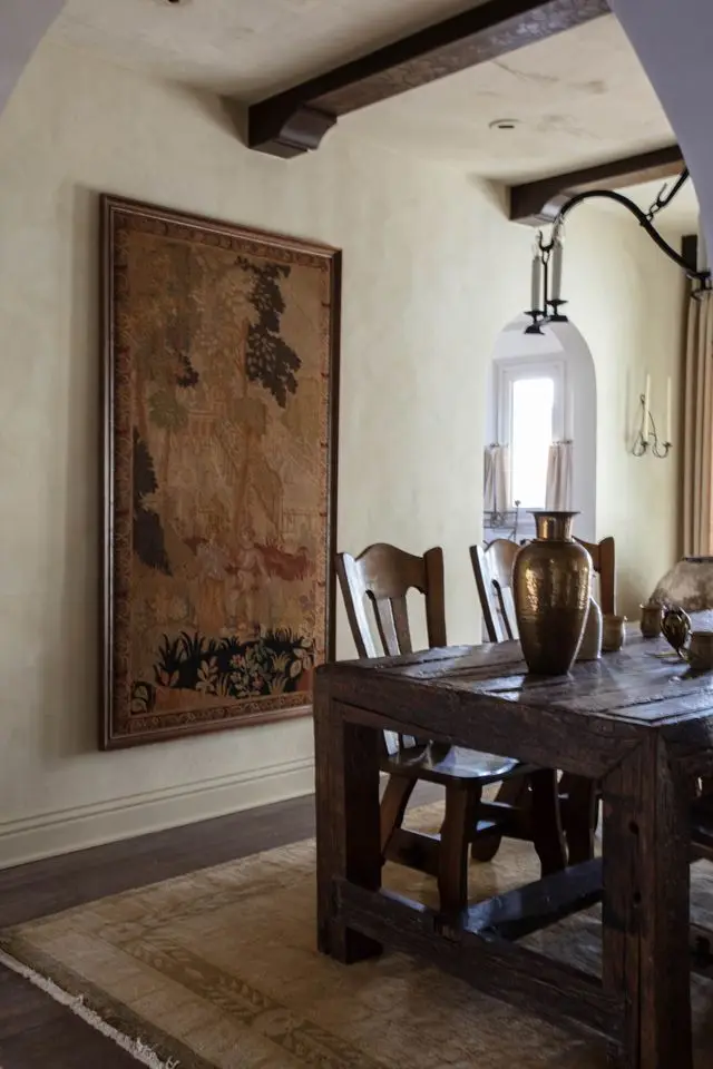 a dining room table with chairs