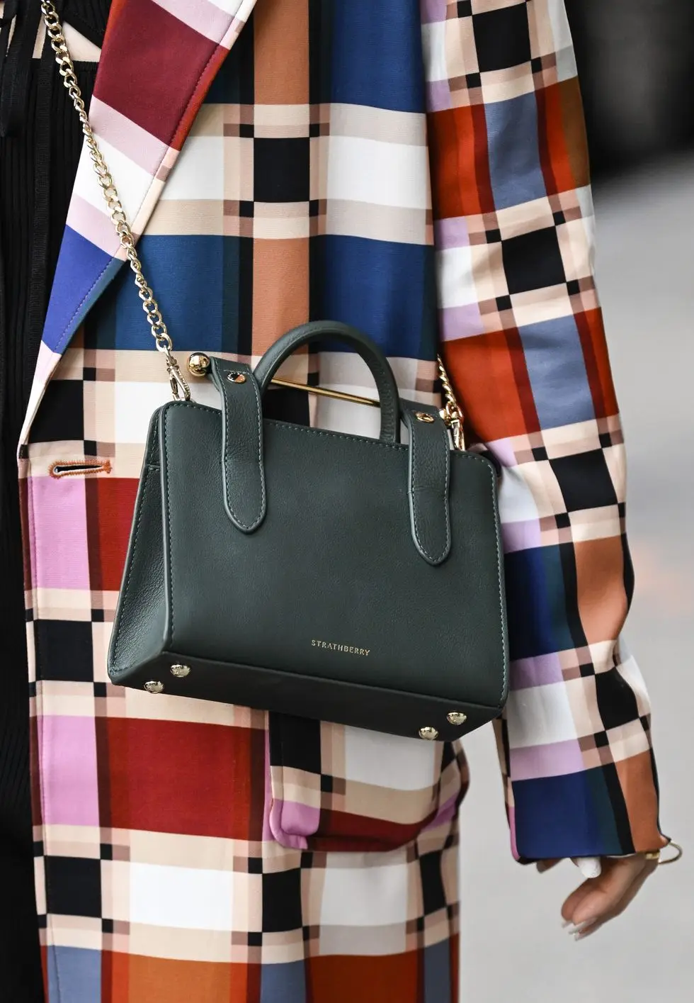 new york, new york february 13 wendy sy is seen wearing a never fully dressed coat, strathberry bag outside the coach show during new york fashion week fw 2023 on february 13, 2023 in new york city photo by daniel zuchnikgetty images