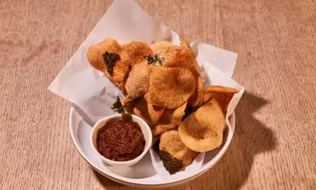 ‘Warm from the fryer’: shrimp crackers, sambal.