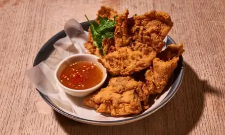 ‘To be dragged through the sweet-sour dipping sauce’: crispy wings.