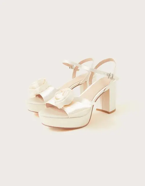 Rosette platform sandals ivory, £100, Monsoon