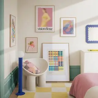 A living room with a gallery wall, modern chair and a wavy mirror on the wall