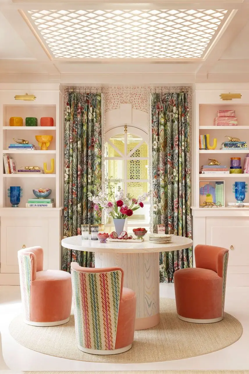 a room with a table and chairs a room with a table and chairs