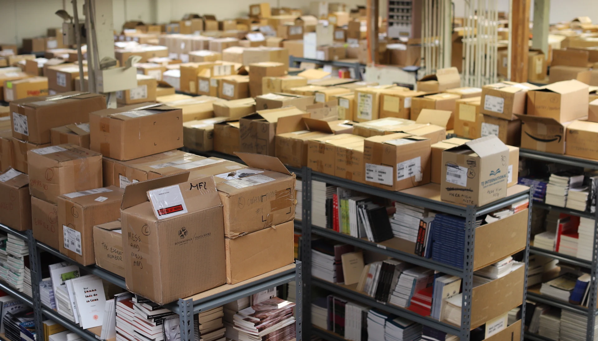 Warehouse shelves full of boxes of books