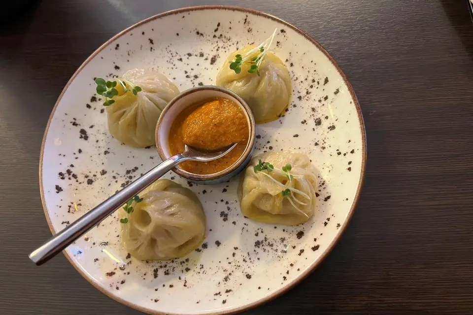 Nepali chicken momos with tomato & sesame achar. Photo: Lucinda O'Sullivan