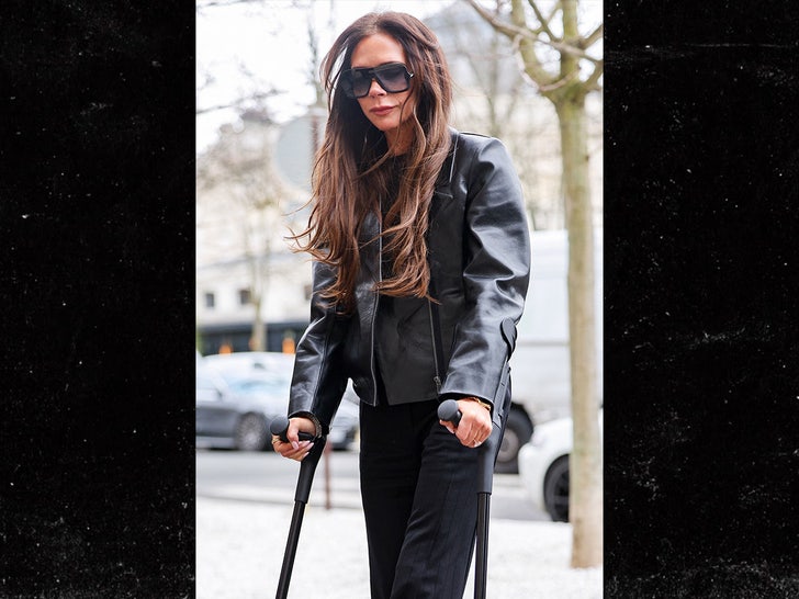 Victoria Beckham Forced to Use Crutches During Paris Fashion Week