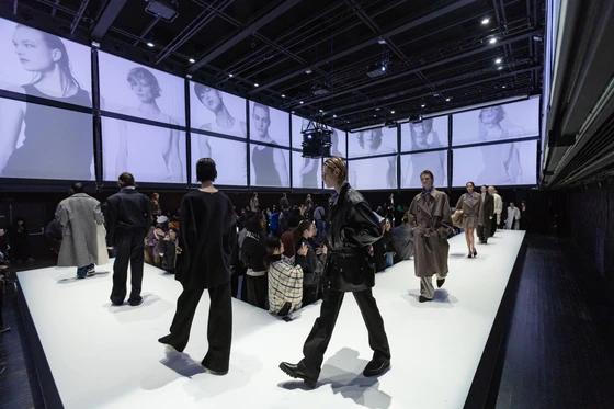 Models showcase clothes from Korean designer brands System and System Homme for the 2024 Fall/Winter Collection at Paris's La Gaîté Lyrique on Jan. 21. [HYUNDAI DEPARTMENT STORE] 