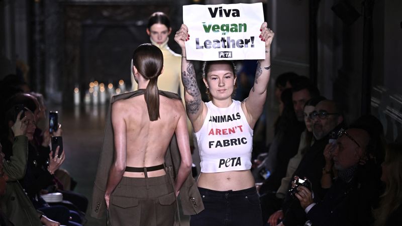 Victoria Beckham’s Paris Fashion Week show stormed by animal rights protesters