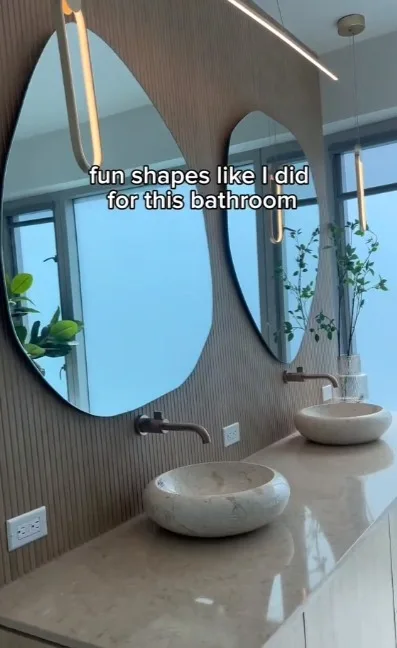 The interior designer cut her sheets or mirror into 'fun shapes' to decorate her bathroom